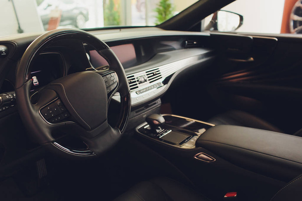 car interior. Modern car speedometer and illuminated dashboard. Luxurious car instrument cluster. Close up shot of car instrument panel. - Fotoğraf, Görsel