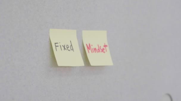 somebody write text mean success on sticky note on board in workplace - Footage, Video