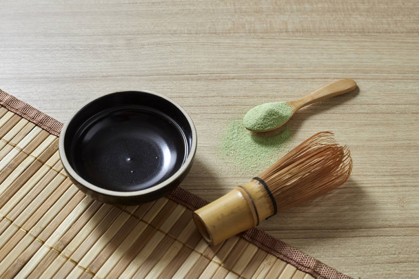 Powdered green tea with bamboo whisk - Photo, Image