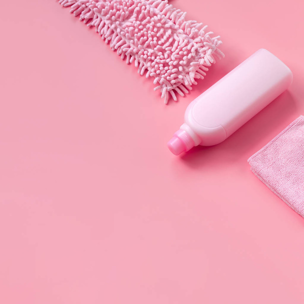 MOP, rag and detergent-pink set on pink background for spring cleaning. Place for text. - Photo, image