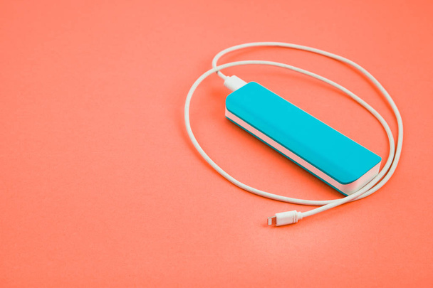 Power bank on color background - Photo, Image