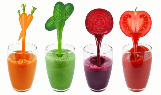 vegetable juices in a dripping glass isolated on white - Photo, Image