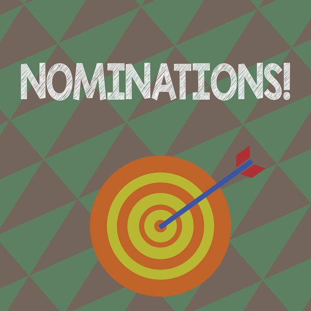 Writing note showing Nominations. Business photo showcasing action of nominating or state being nominated for prize Dart Board in Concentric Style with Arrow Hitting the Center Bulls Eye. - Photo, Image