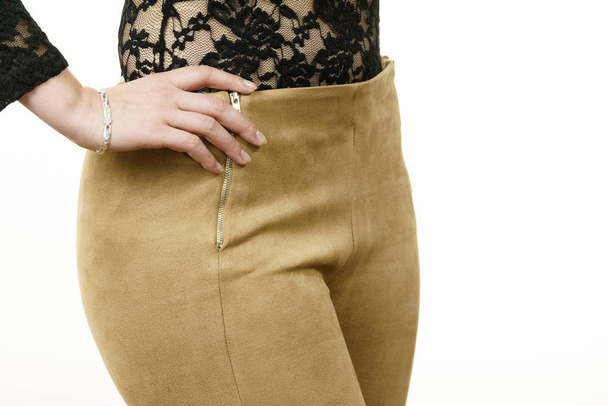 Brown suede trousers and lace top - Фото, зображення