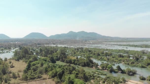 Aerial: flying over Don Det and the 4003 islands Mekong River in Laos, Li Phi waterfall, famous tourist destination in South East Asia, stunning landscape. Native cinelike D-log color profile - Footage, Video