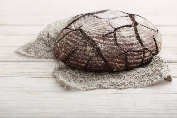  homemade bread on  white wooden background - Foto, Imagen