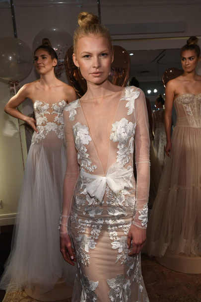 NEW YORK, NY - APRIL 10: Models presenting dresses during the Eisen Stein Spring 2020 bridal presentation at New York Fashion Week: Bridal on April 10, 2019 in New York City.  - Φωτογραφία, εικόνα