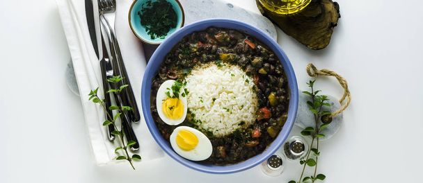 banner of rice with black beans and boiled egg on the table with - Fotoğraf, Görsel