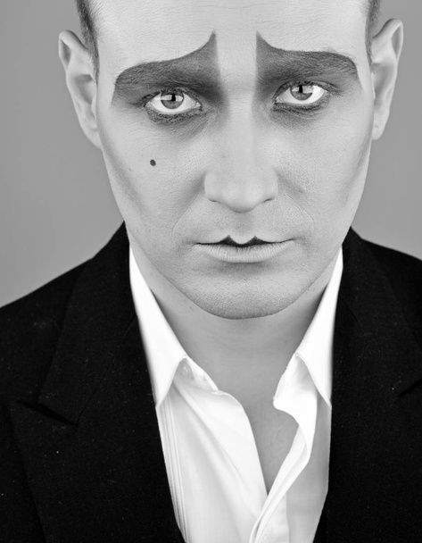 Having talent and charisma. Theatre actor miming. Mime with face paint. Mime artist. Man with mime makeup. Stage actor playing. Drama or tragedian performer. Theatrical performance art and pantomime - Фото, зображення