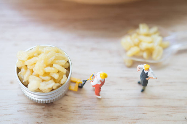 Miniature people chef select moong dal namkeen fresh and crisp.  - Photo, Image