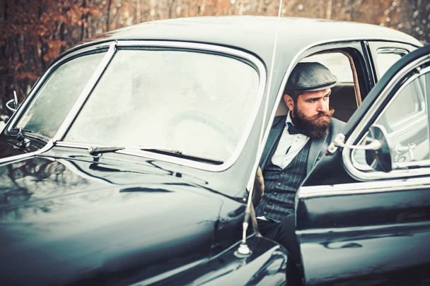 Couple in love on romantic date. Travel and business trip or hitch hiking. Escort of girl by security. Bearded man and sexy woman in car. Retro collection car and auto repair by mechanic driver. - Fotó, kép
