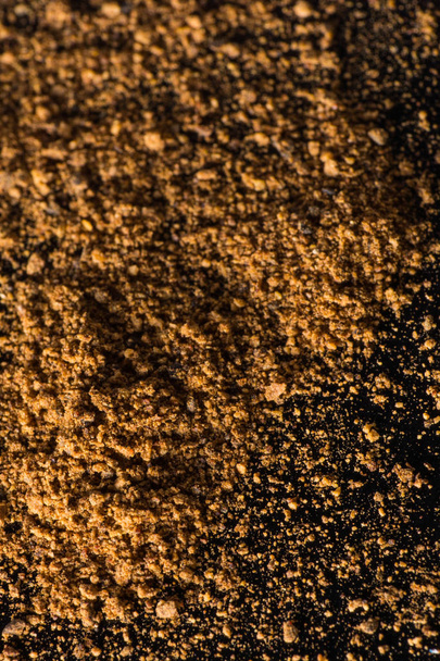 Closeup of cinnamon powder, food background  - Фото, изображение