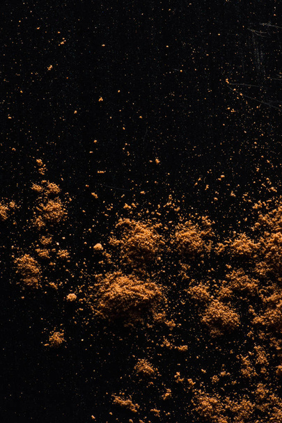 Closeup of cinnamon powder, food background  - Фото, зображення
