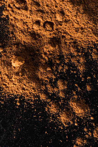 Closeup of cinnamon powder, food background  - Foto, imagen
