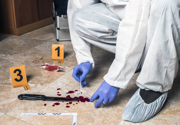  Expert Police takes blood sample from a blood knife at the scene of a crime, conceptual image - Fotoğraf, Görsel