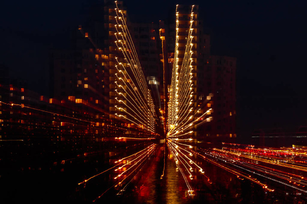cidade noturna em movimento de linhas de luz
 - Foto, Imagem