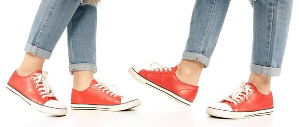 Set woman legs feet jeans red sneakers, side view - Φωτογραφία, εικόνα