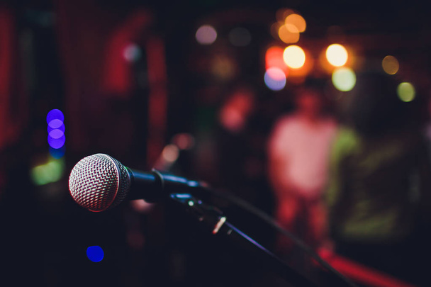 microphone against blur on beverage in pub and restaurant background. - Φωτογραφία, εικόνα