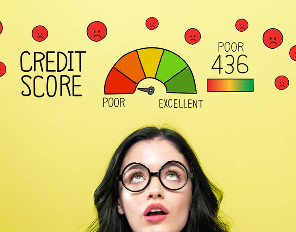 Poor credit score theme with young woman - Фото, изображение