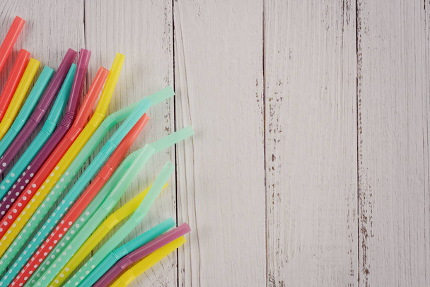 Plastic straws and planet pollution concept. Single use straws are on the war on plastic. - Φωτογραφία, εικόνα
