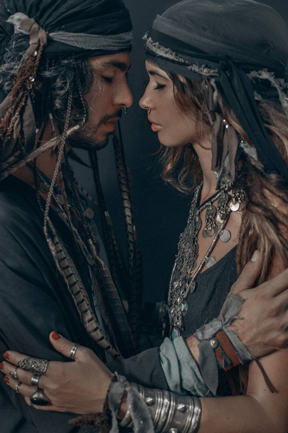 stylish fashionable young handsome man and woman. gypsy fashion  - Foto, afbeelding
