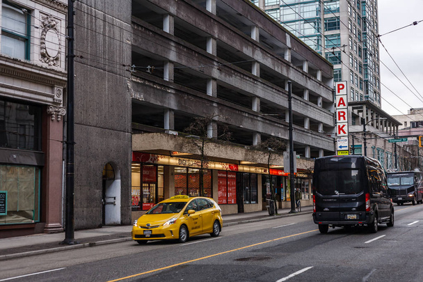 VANCOUVER, CANADA - March 12, 2019: View of buildings and roads in downtown at spring day. - Fotó, kép