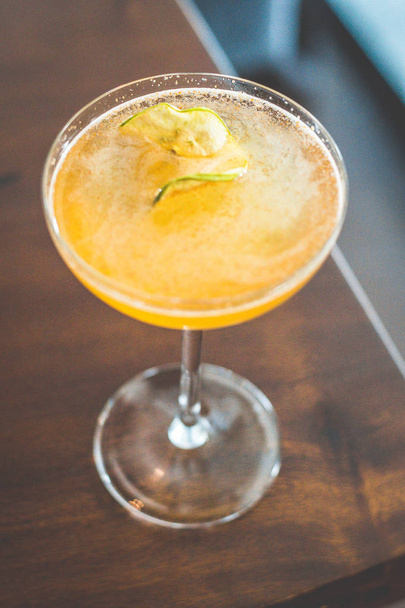Coppertone cocktail, made with whisky, flat apple cider, apple cider vinegar and maple cayenne pepper  - 写真・画像