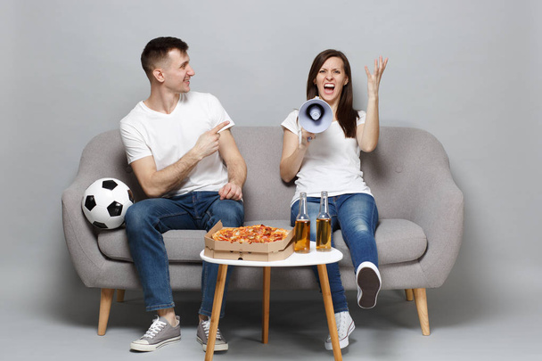 Angry couple woman man football fans cheer up support favorite t - Photo, Image