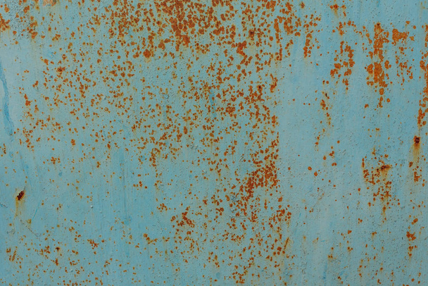 Metal texture with scratches and cracks which can be used as a background - Foto, Bild