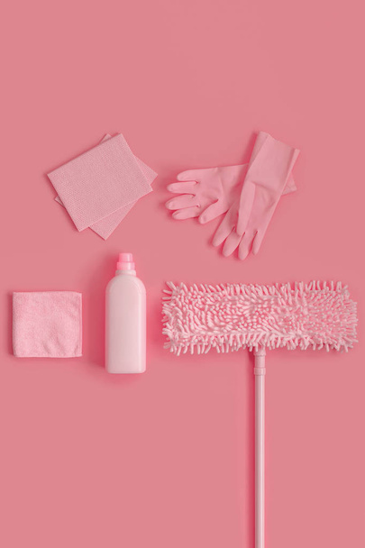 Cleaning kit  on a pink background. Copy space. - Zdjęcie, obraz