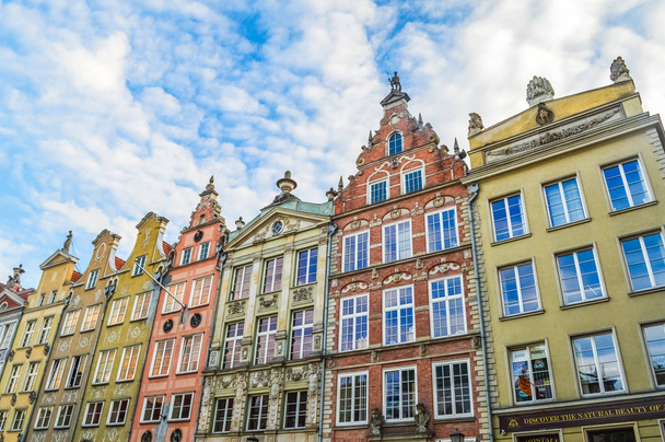 GDANSK, POLAND - SEPTEMBER 02 2018: Traditional architecture on cloudy sky background  - Photo, image