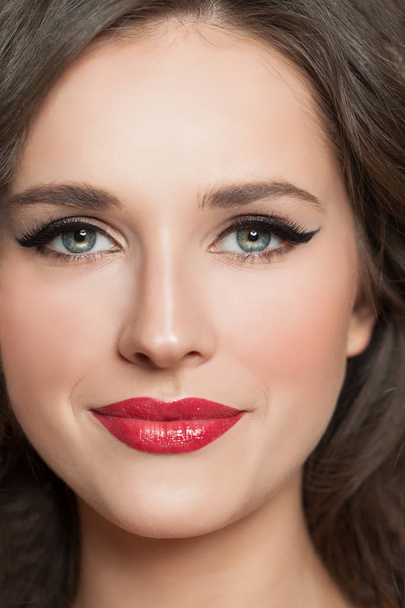 Young woman face with makeup closeup portrait - Photo, Image
