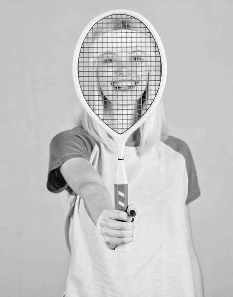 Active lifestyle. Woman hold tennis racket in hand. Tennis club concept. Tennis sport and entertainment. Active leisure and hobby. Girl fit slim blonde play tennis. Sport for maintaining health - Fotoğraf, Görsel
