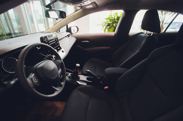 Interior view of car with black salon. steering wheel, auto - Фото, зображення