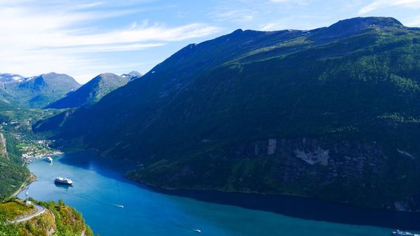 Fjord Geirangerfjord with ferry boat, Norway. - 写真・画像
