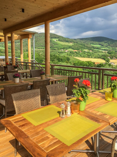 Terrace with tables and chairs in restaurant  - Photo, Image