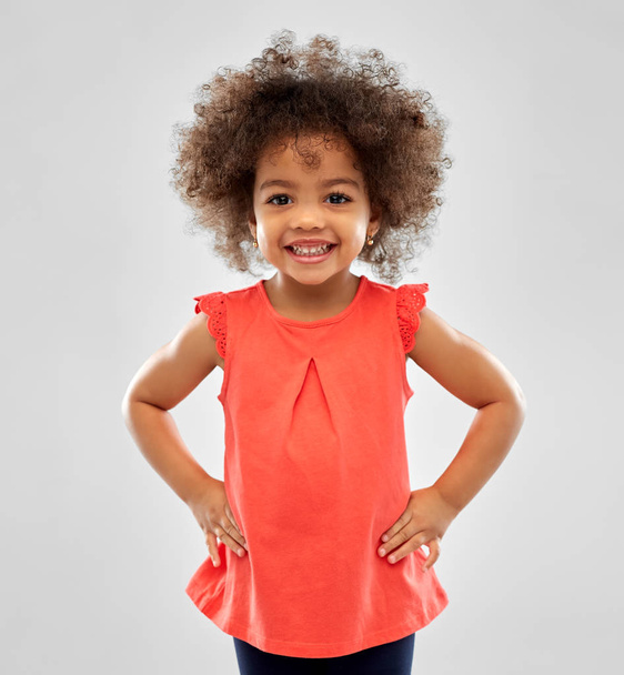 happy little african american girl over grey - Fotó, kép