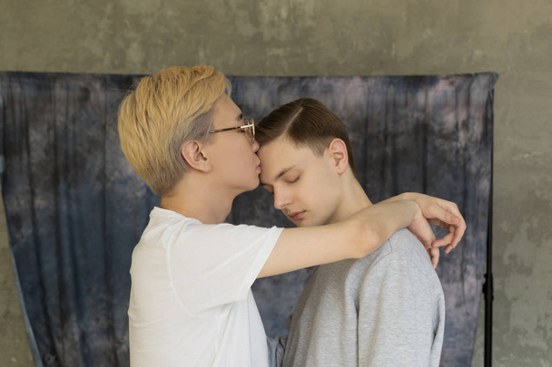 Young international homosexuals gay couple love each other - Photo, Image