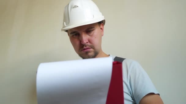 Construction Site Engineerer Working with Blueprint - Video, Çekim