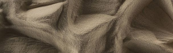 panoramic shot of textured golden sand with shadows  - Фото, изображение