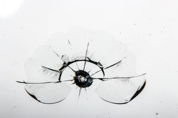 Cracked glass on a white background texture - 写真・画像