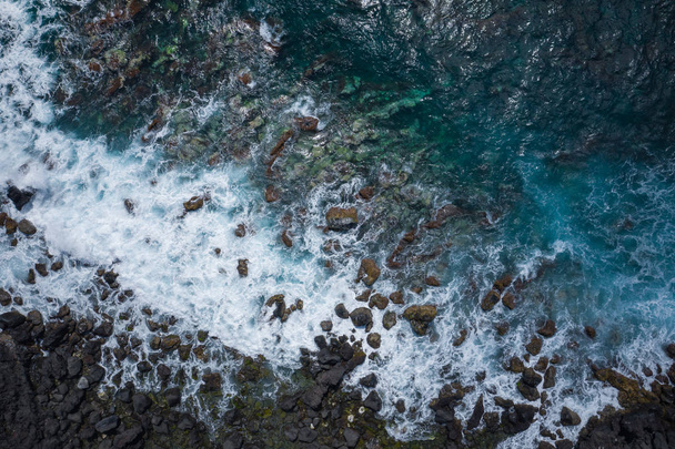 Aerial view to ocean waves. Blue water background. Photo made fr - Photo, Image