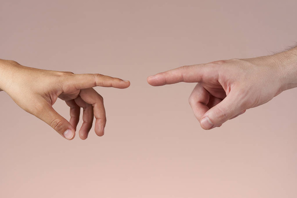 Fingers reaching each other - Photo, Image