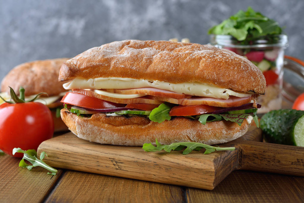Ciabatta sandwich with arugula - Фото, зображення