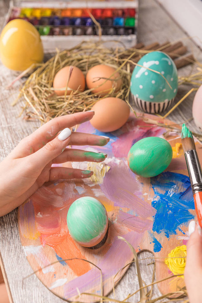 Easter composition with Easter eggs on wooden background - Photo, image