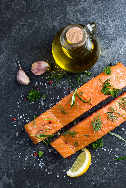 Preparing salmon fillets with herbs and spices - Φωτογραφία, εικόνα