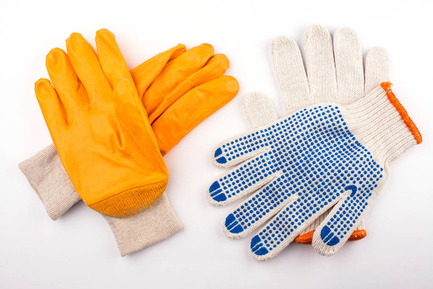 handschoenen voor het werk. handschoenen close-up. Handbescherming - Foto, afbeelding