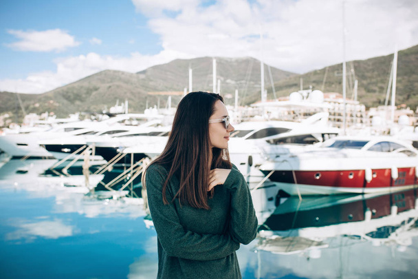 Beautiful girl near the yacht - Zdjęcie, obraz