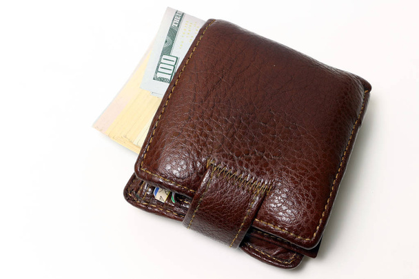 Brown wallet with money isolated on white background. - Φωτογραφία, εικόνα