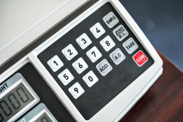 Closeup of electronic weight scale, detail of numeric keypad - Foto, afbeelding